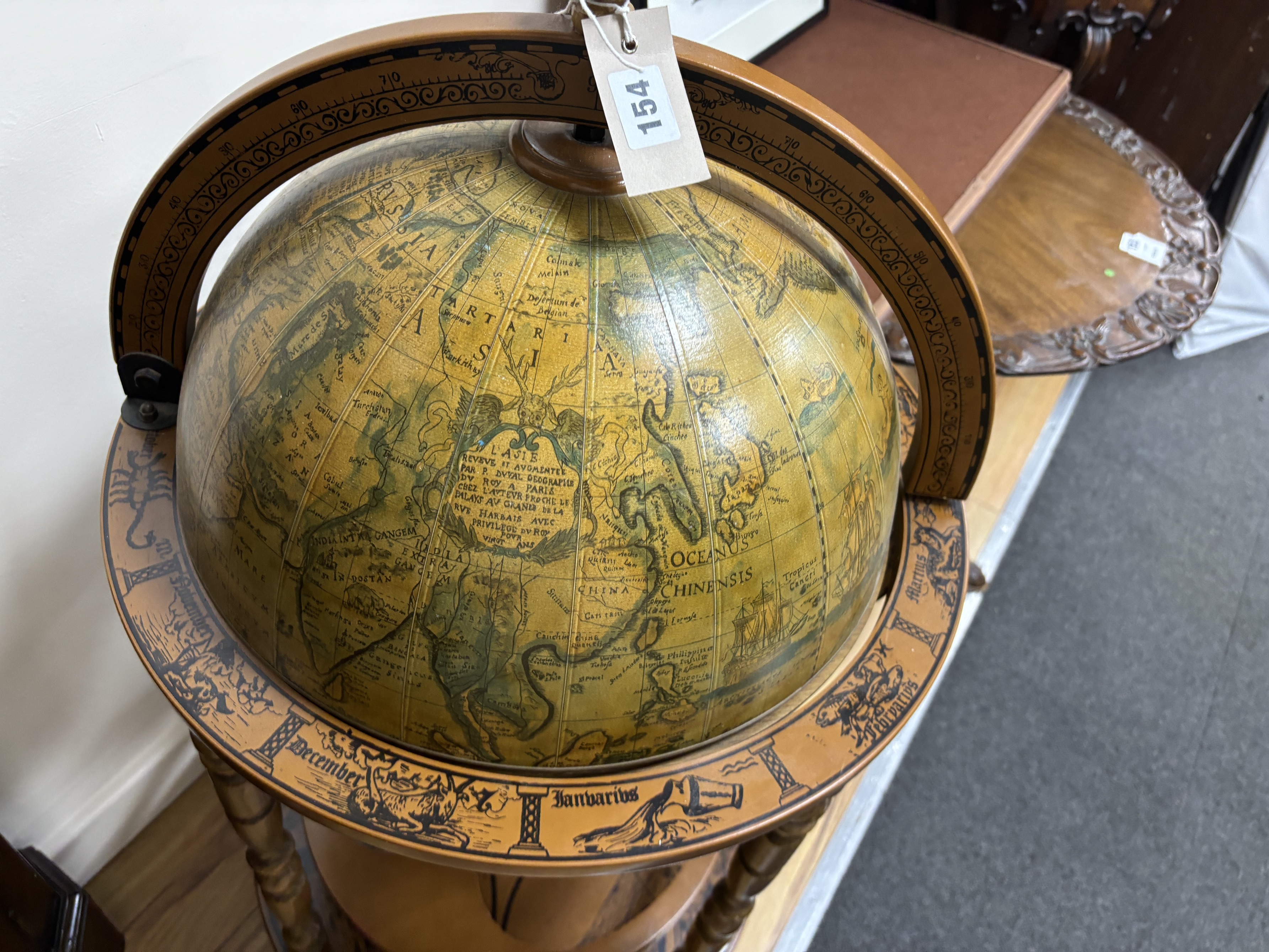 A reproduction globe drinks trolley, height 92cm